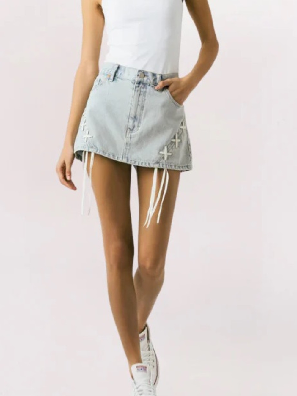 Blank NYC Light Wash Denim Mini Skirt with Lace-Up Details